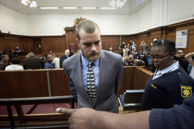 Son who slaughtered rich S.African family with axe handed 3 life terms