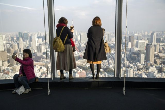 Japan confirms its economy shrank after two years of growth
