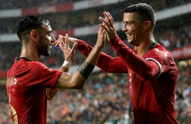 Ronaldo return inspires Portugal past Algeria