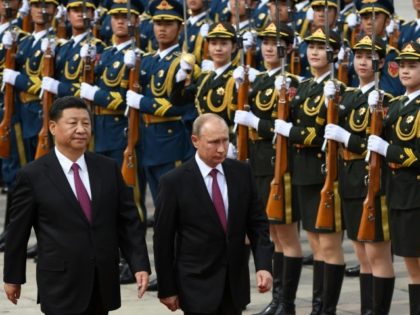 China hosts Russia, Iran for summit as US tensions rise
