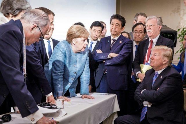 Merkel-Trump G7 face-off photo headed for history books