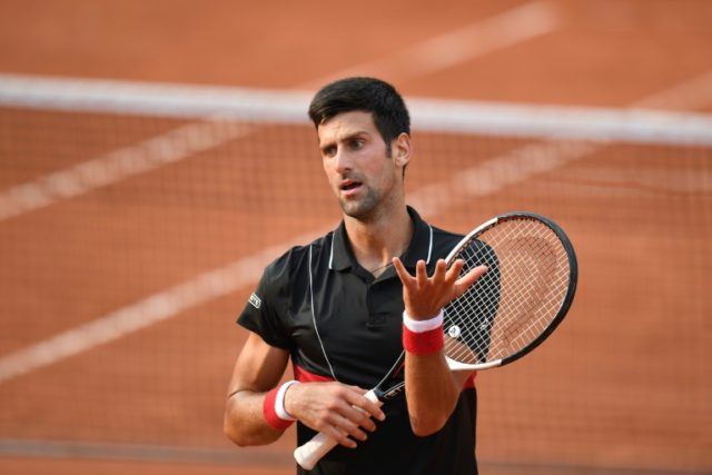 Troubled Djokovic to play Wimbledon warm-up at Queen's Club