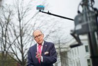 In this file photo taken on April 6, 2018 National Economic Council Director Larry Kudlow speaks during an interview in front of the White House in Washington, DC Trump tweets that his top economic advisor suffered heart attack