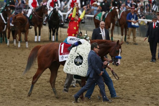 Justify dominates Belmont to become 13th Triple Crown winner