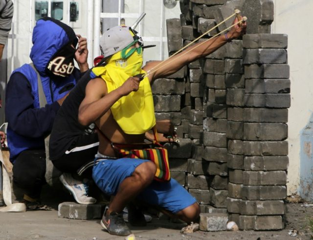 Violence erupts in Nicaragua capital as police dismantle blockades