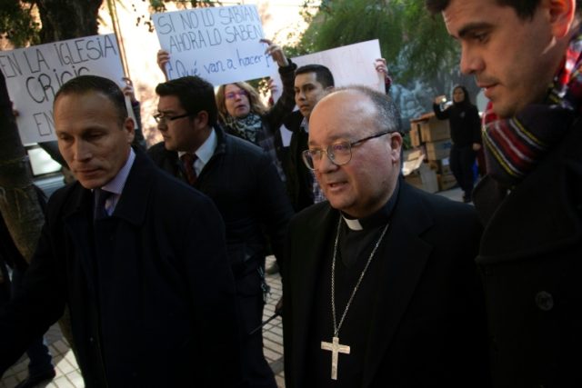 Chile authorities raid sites linked to church sex abuse
