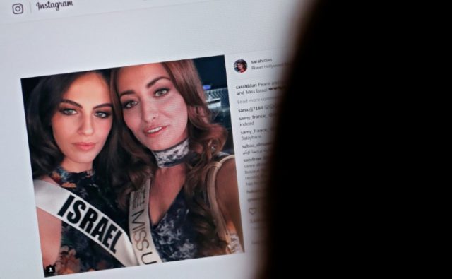 Ex-miss Iraq calls for peace on Israel visit after selfie scandal