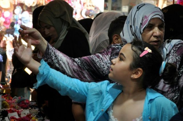 Midnight market abuzz in Syria's divided Hasakeh