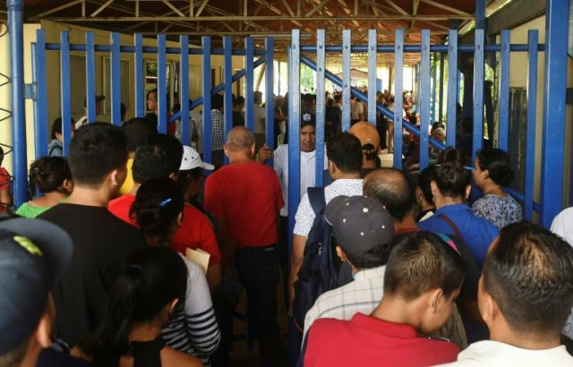 Nicaraguans flood migration offices in bid to flee crisis