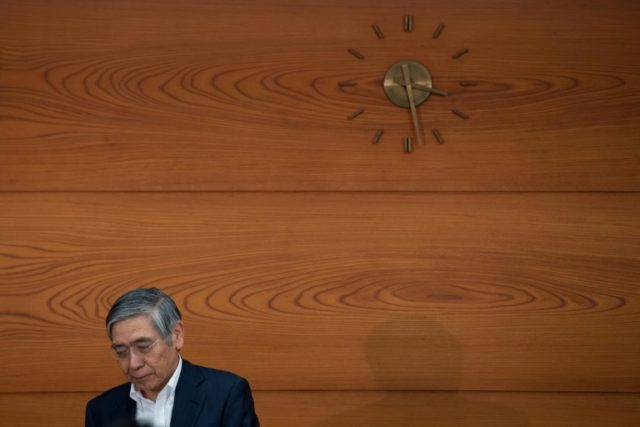 Bank of Japan sticks with easing as Fed, ECB tighten policy