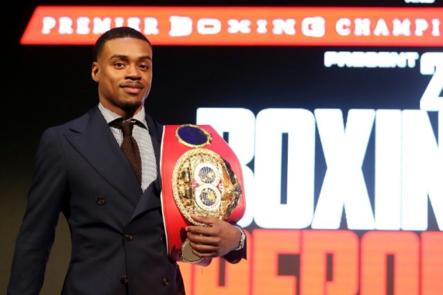 Americans Spence, Roman defend boxing crowns
