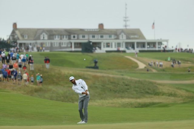 Johnson in command at US Open, Woods likely to miss cut