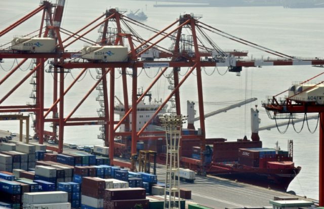 US imports push Japan into trade deficit in May