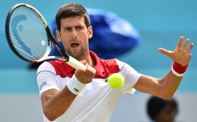 Djokovic cruises at Queen's, Murray set to return