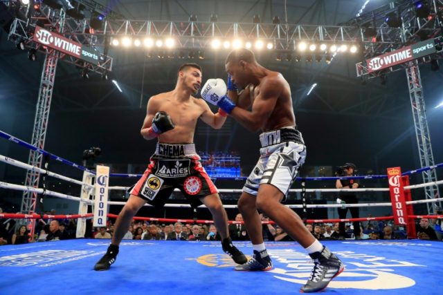 Spence keeps title with first-round KO of Ocampo