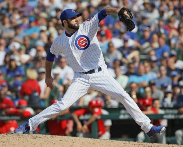 Cubs closer Morrow injured while taking his pants off