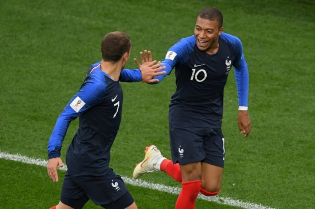 Mbappe makes history as France battle into World Cup last 16