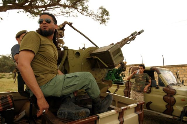 Libya strongman's forces say key oil ports recaptured
