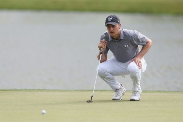 Spieth, Johnson share Travelers lead with McIlroy one back