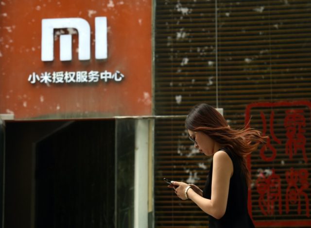 Xiaomi lowers target as it kicks off IPO