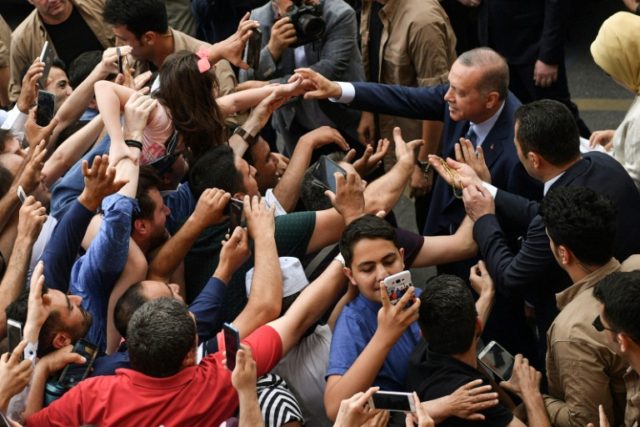 Erdogan leads partial count in pivotal Turkey poll