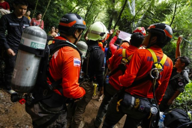 Desperate search for 12 children trapped in Thailand cave