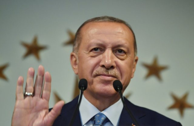 Turkey's Erdogan fetes poll triumph, opposition troubled