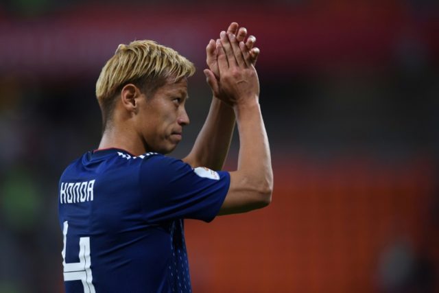 Japan defy doubters to home in on World Cup last 16