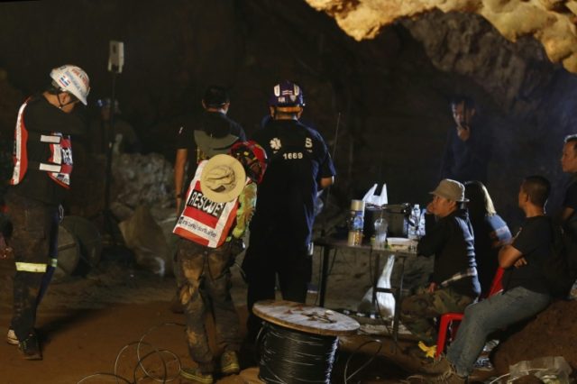 12 children trapped in flooded Thailand cave