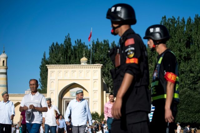 Chinese firms cash in on Xinjiang's growing police state