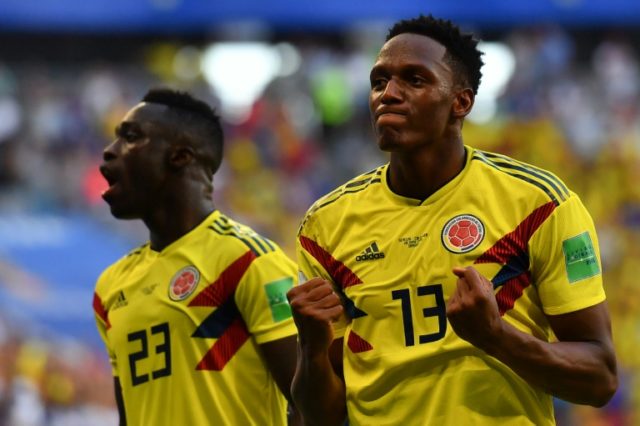 Mina winner sends Colombia through as ill-disciplined Senegal go out