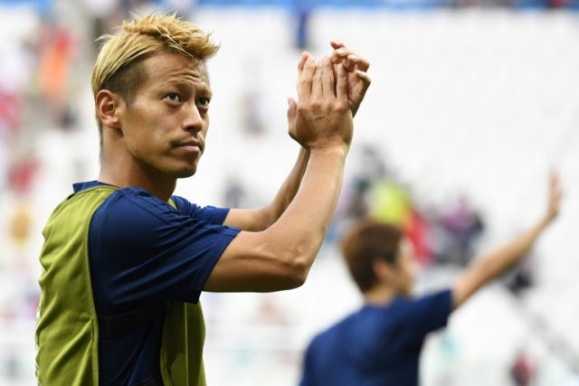 Japan squeak into World Cup knockouts alongside Colombia on fair play record