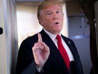 US President Donald Trump speaks to the press aboard Air Force One US President Donald Trump speaks to the press aboard Air Force One