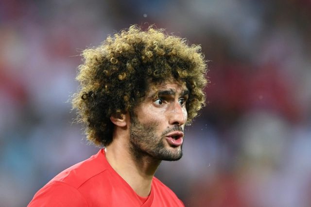 Fellaini signs new United contract to end speculation over future