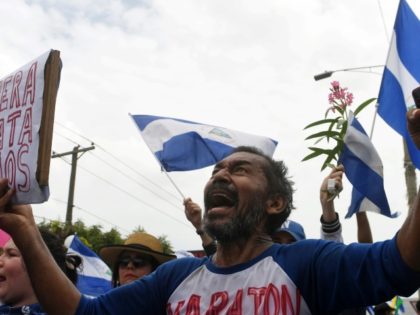 At least two dead in Nicaragua's day of anti-Ortega marches