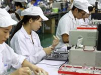China Trade In this June 23, 2018, photo, workers inspect the micro motors for handsets at a factory in Huaibei in central China's Anhui province. China's government defended its trade record as a benefit to the world in a new effort Thursday, June 28, 2018 to defuse U.S. and European pressure over market access and technology policy. (Chinatopix via AP) The Associated Press