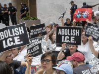 Democrats Politics of ICE Hundreds of activists protest the Trump administration's approach to illegal border crossings and separation of children from immigrant parents, in the Hart Senate Office Building on Capitol Hill in Washington, Thursday, June 28, 2018. Several prominent Democrats who are mulling a bid for the White House in 2020 sought to bolster their progressive credentials this week by calling for major changes to immigration enforcement, with some pressing for the outright abolition of the federal government’s chief immigration enforcement agency. (AP Photo/J. Scott Applewhite) Hundreds of activists protest the Trump administration's approach to illegal border crossings and separation of children from immigrant parents, in the Hart Senate Office Building on Capitol Hill in Washington, Thursday, June 28, 2018. Several prominent Democrats who are mulling a bid for the White House in 2020 sought to …