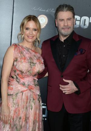 John Travolta, Kelly Preston cozy up at 'Gotti' premiere