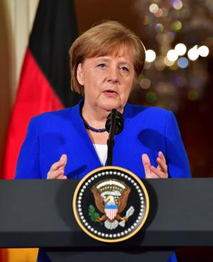 Merkel faces 2-week ultimatum to secure asylum deal