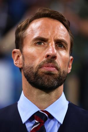 World Cup: England's manager dislocates shoulder during jog