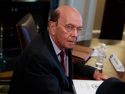 Secretary of Commerce Wilbur Ross listens during a meeting between President Donald Trump and steel and aluminum executives in the Cabinet Room of the White House, Thursday, March 1, 2018, in Washington. (AP Photo/Evan Vucci)