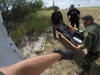 07_17_18 Rescue 2 Border Patrol agents rescue an illegal immigrant who fell victim to the Texas heat near the Rio Grande River. (Photo: U.S. Border Patrol/Rio Grande Valley Sector)