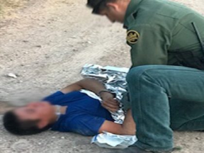 A Border Patrol agent assigned to the Laredo South Station provides life-saving care to an illegal alien from Guatemala. (Photo: U.S. Border Patrol/Laredo Sector)