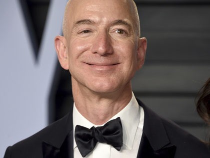Jeff Bezos arrives at the Vanity Fair Oscar Party on Sunday, March 4, 2018, in Beverly Hil