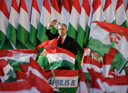 Prime Minister Viktor Orban's waves during the final electoral rally of his Fidesz party in Szekesfehervar, Hungary, Friday, April 6, 2018. Hungarians will vote Sunday in parliamentary elections, choosing 199 lawmakers and polls expect Prime Minister Viktor Orban to win a third consecutive term and his fourth overall since 1998.(AP …