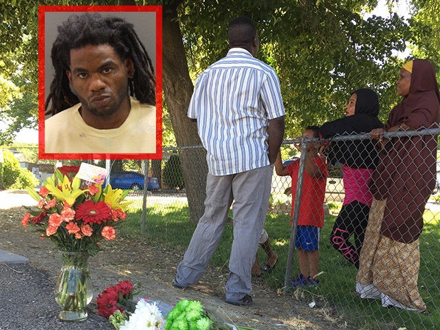 Flowers from well-wishers are left just outside a Boise, Idaho, apartment complex, Sunday,