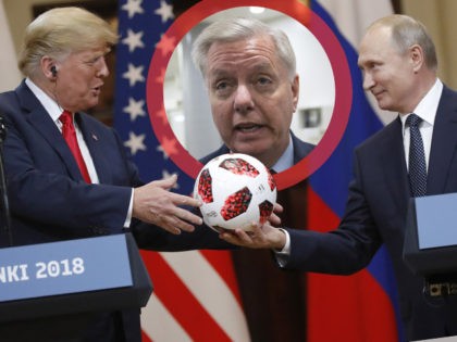 Russian President Vladimir Putin gives a soccer ball to U.S. President Donald Trump, left,