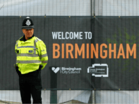 Police officers and security stand outside the perimetre around the International Convention Centre venue in Birmingham, central England, on October 1, 2016 on the eve of the start of the ruling Conservative party annual conference. Britain's ruling Conservative party will hold its annual conference at the ICC in Birmingham from …