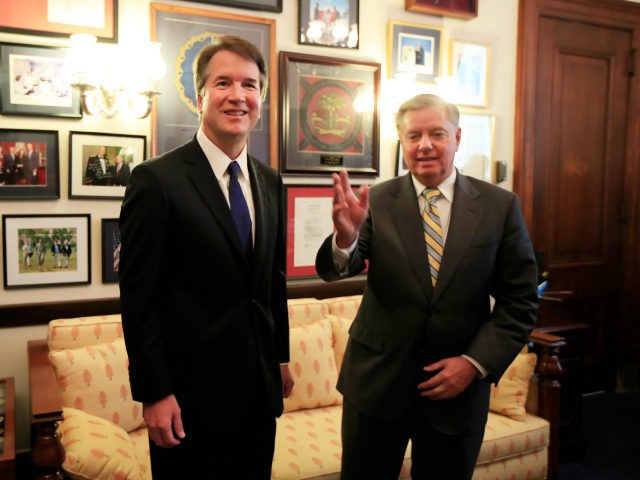 Supreme Court nominee Brett Kavanaugh, left, stands with Sen. Lindsey Graham, R-S.C. befor