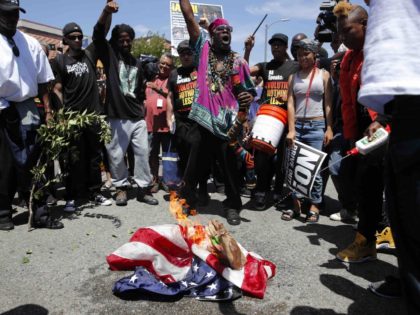 Burning flag Maxine Waters (Jae C. Hong / Associated Press)